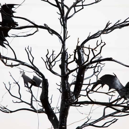 4ft. Pre-Lit Artificial Halloween Black Spooky Twig Tree with Bats and 120 Orange & Purple LED Lights